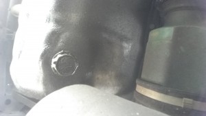 oil plug on bottom of oil pan